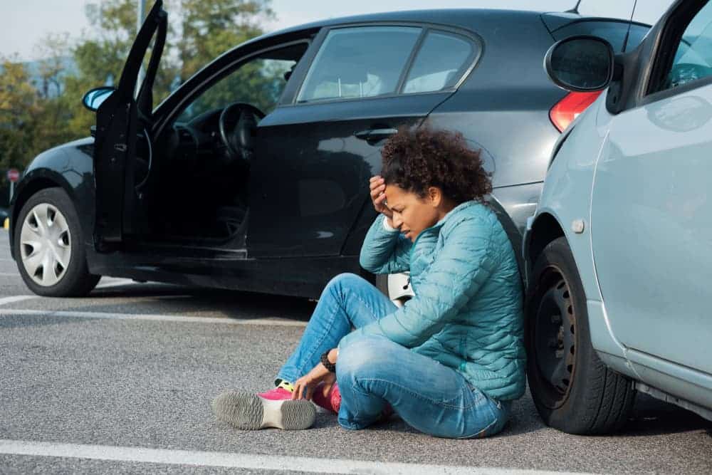 Enduring painful wait for first aid after a car crash.